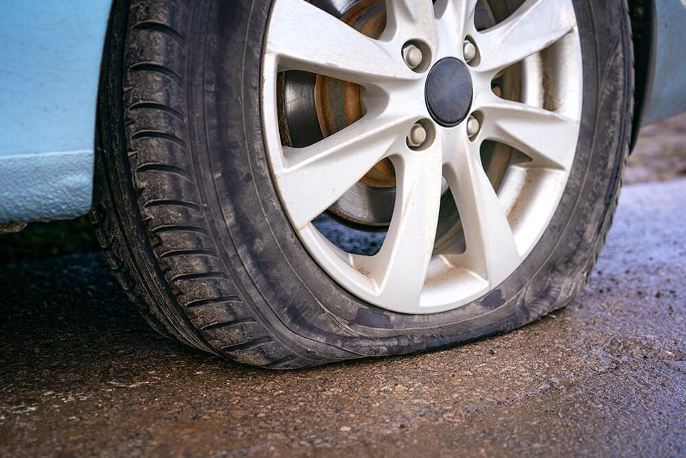 Car With Flat Tire